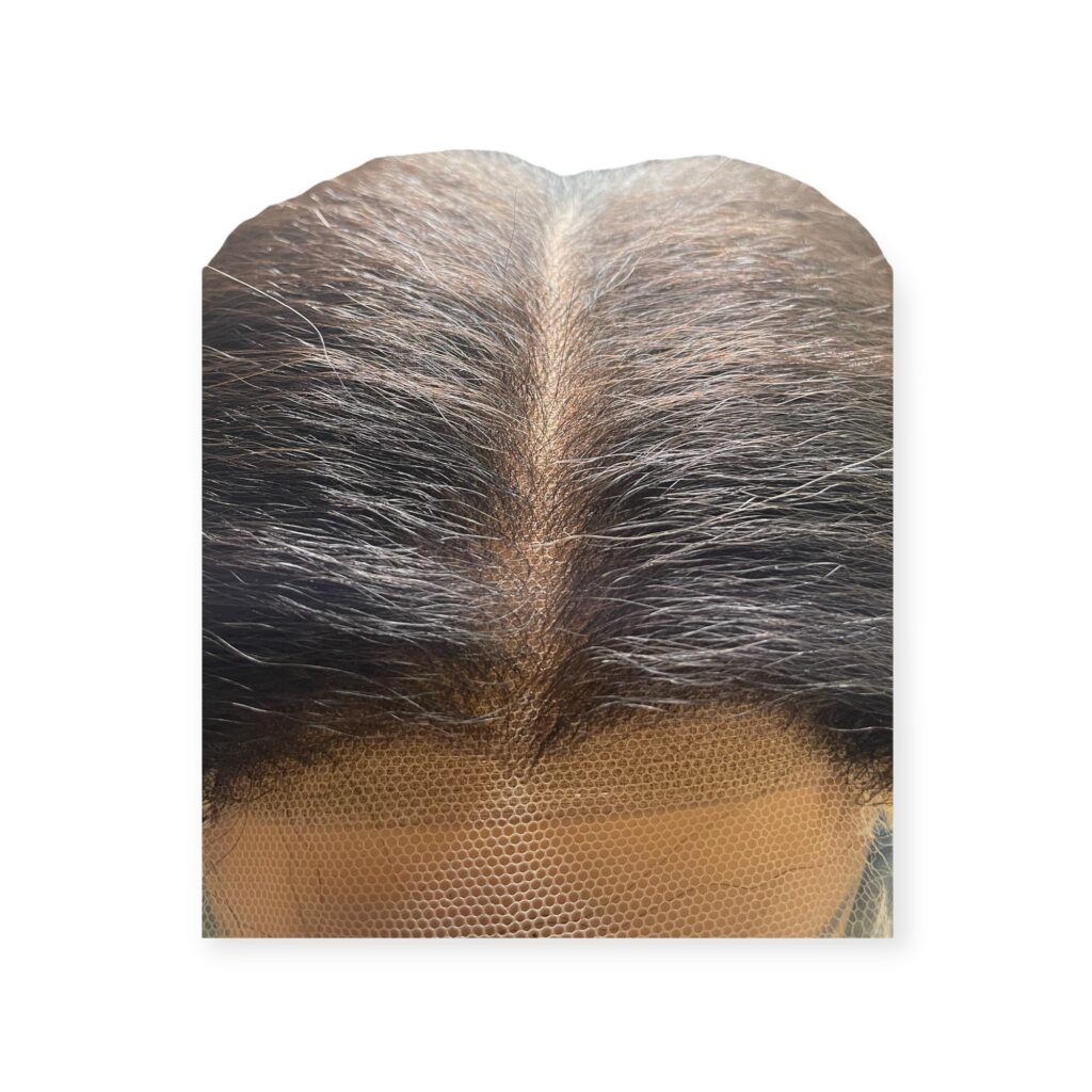 The back of a woman's head with a Lace Wig Melting Kit.